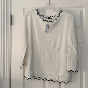 White and black sweater